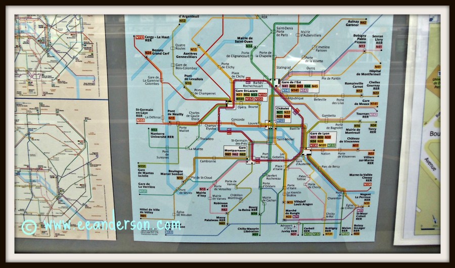 Transit maps posted at bus stops Paris